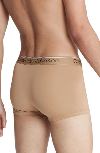 Shop Calvin Klein 3-pack Low Rise Microfiber Stretch Trunks In Beige/ Black/ Blue