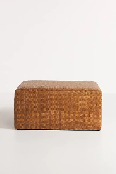 Shop Anthropologie Cove Woven Leather Ottoman