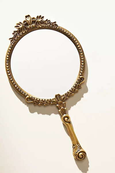 Shop Anthropologie Gleaming Primrose Hand Mirror