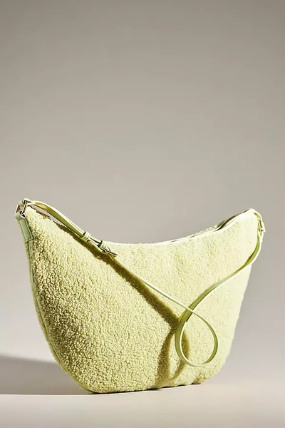 Shop Mali + Lili Oversized Sherpa Sling Bag In Green
