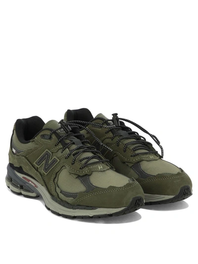 Shop New Balance "2002rd" Sneakers In Green