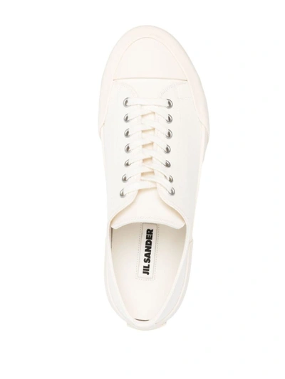 Shop Jil Sander Sneakers & Slip-on In White