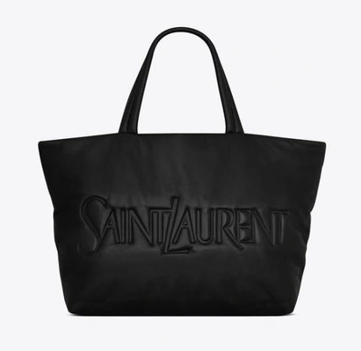 Shop Saint Laurent Logo-debossed Leather Tote Hand Bag In Black