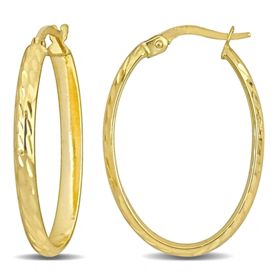 Mimi & Max 29mm Oval Textured Hoop Earrings In 10k Yellow Gold In Yellow