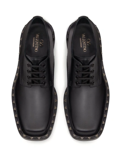 Shop Valentino Garavani Loafers In Black
