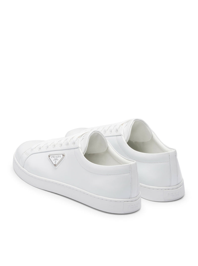 Shop Prada Men Brushed Leather Sneakers In White