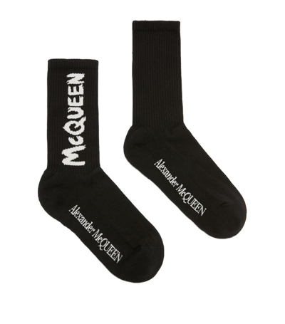 Shop Alexander Mcqueen Logo Socks In Black