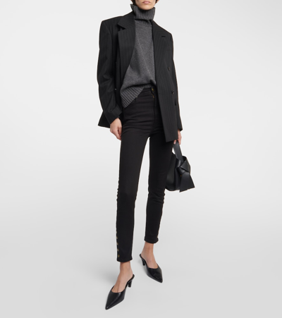 Shop Frame The Snapped Skinny Jeans In Black