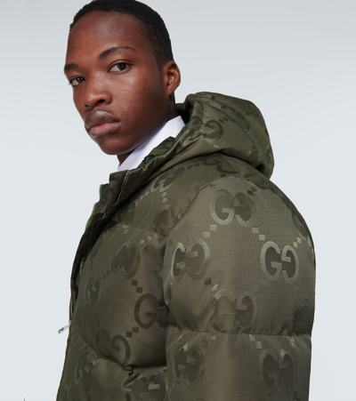 Shop Gucci Jumbo Gg Canvas Down Jacket In Green