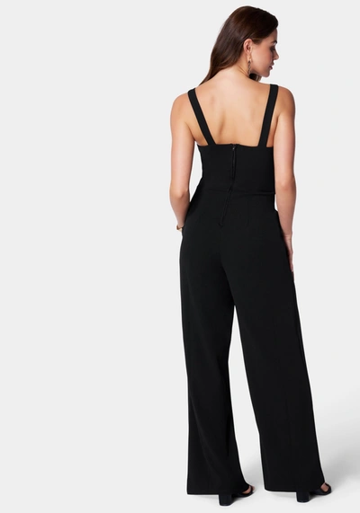 Shop Bebe V Wire Core Jumpsuit In Black