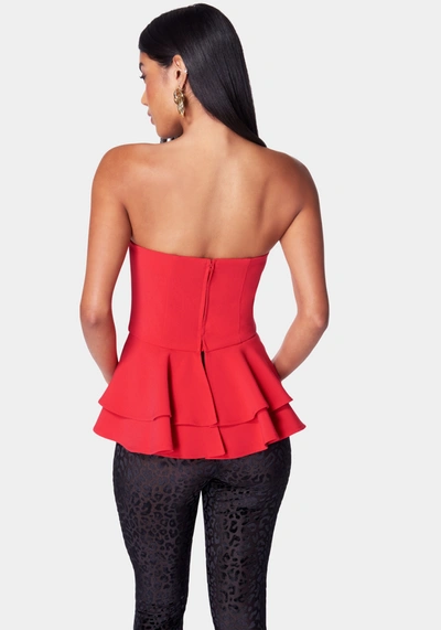 Bebe Strapless U Ring Peplum Top In Salsa