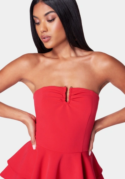 Bebe Strapless U Ring Peplum Top In Salsa