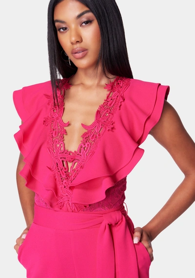 Shop Bebe Lace Trim Knit Crepe Palazzo Jumpsuit In Pink Peacock