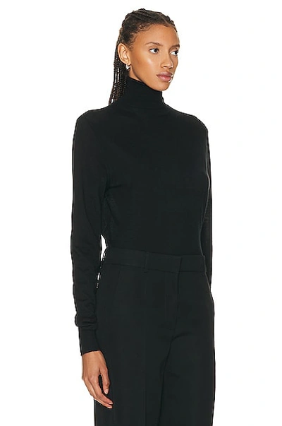 The Row Heva Turtleneck Sweater In Black
