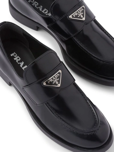 Shop Prada Triangle-logo Leather Loafers In Nero