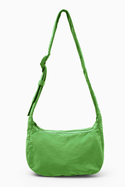 Shop Cos Crossbody Saddle Bag - Nylon In Green