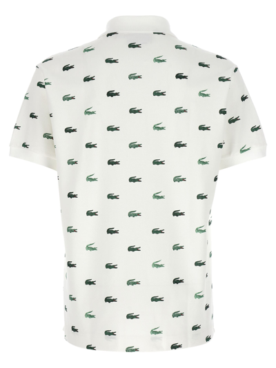 Shop Lacoste Logo Print Polo Shirt In White
