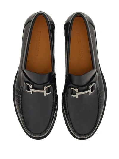 Shop Ferragamo Gancini Leather Loafers In Black