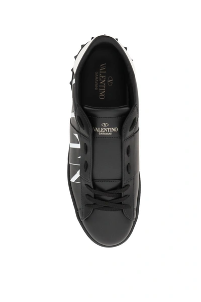 Shop Valentino Garavani Open Vltn Sneakers In Black