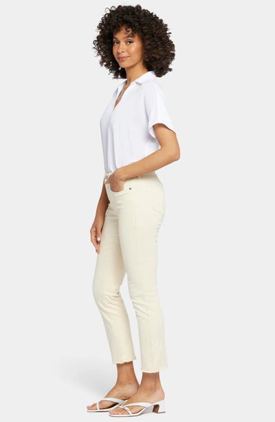 Shop Nydj Sheri Frayed Hem Slim Jeans In Banana Sorbet