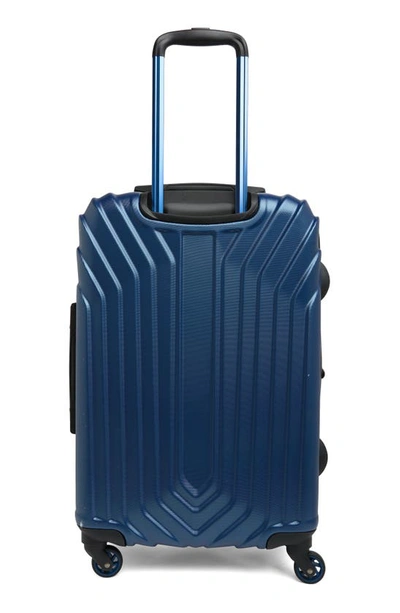 Shop Original Penguin Blake Collection 25" Hardshell Spinner Suitcase In Metallic Blue