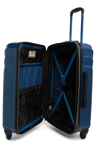 Shop Original Penguin Blake Collection 25" Hardshell Spinner Suitcase In Metallic Blue