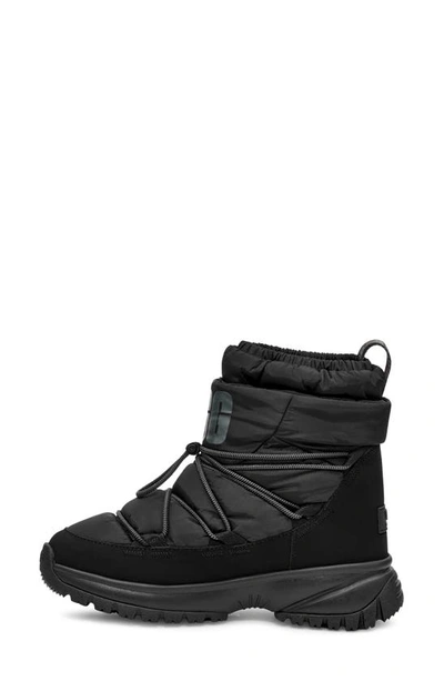 Shop Ugg Yose Genuine Shearling Lined Mid Puffer Boot In Black