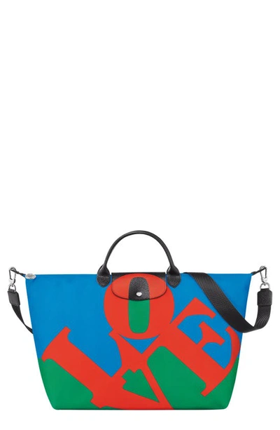 Shop Longchamp X Robert Indiana Medium Le Pliage Recycled Polyester Canvas Duffle Bag In Red