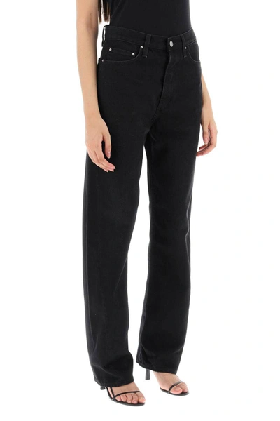 Shop Totême Toteme Jeans With Dark Wash And Twisted Seams In Black