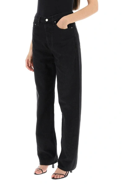 Shop Totême Toteme Jeans With Dark Wash And Twisted Seams In Black