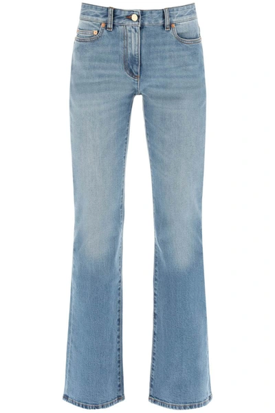 Shop Valentino Vlogo Chain Flared Jeans In Blue