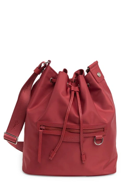 Shop Longchamp Neoprene Bucket Bag In Red