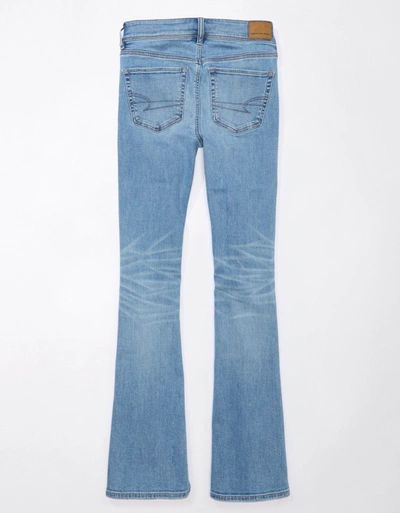 Shop American Eagle Outfitters Ae Stretch Low-rise Ripped Kick Bootcut Jean In Blue