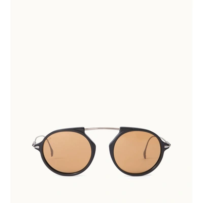 Shop Tod's Sunglasses In Beige