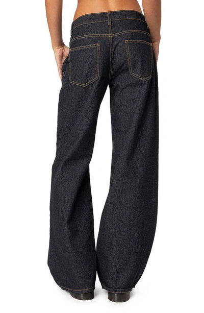 Shop Edikted Raelynn Low Rise Wide Leg Jeans In Indigo-blue-raw-wash