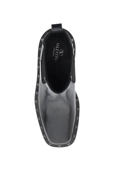 Shop Valentino Garavani Rockstud M-way Leather Beatle Boots In Black