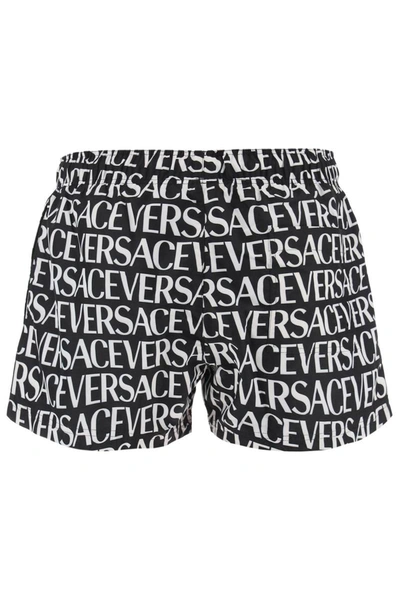 Shop Versace Allover Swim Trunks In Multicolor