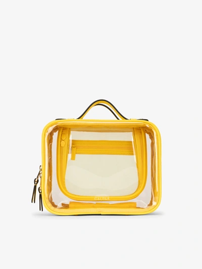 Shop Calpak Medium Clear Cosmetics Case In Lemon