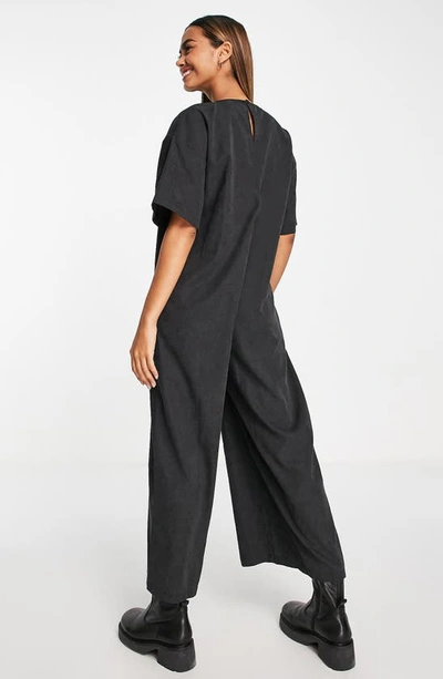 Shop Asos Design Oversize T-shirt Jumpsuit In Black
