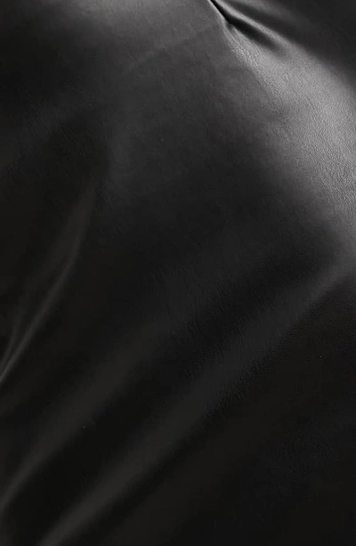 Shop Asos Design Curved Hem Faux Leather Miniskirt In Black