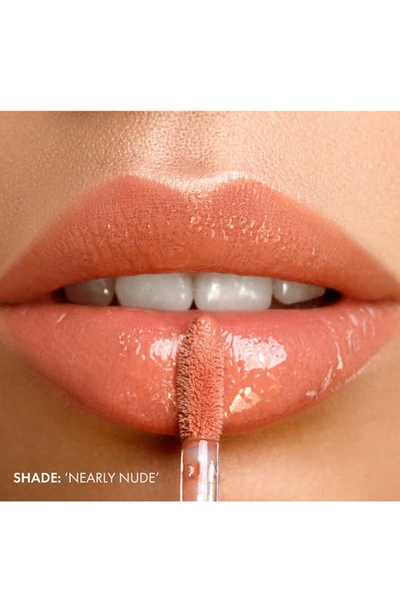 Shop Iconic London Lip Plumping Gloss In Nearly Nude