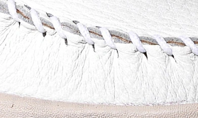 Shop Minnetonka Discover Deerskin Loafer In White