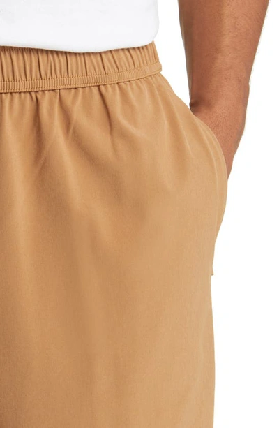 Shop Beyond Yoga Pivotal Performance Shorts In Toffee
