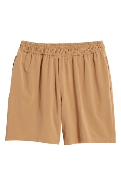 Shop Beyond Yoga Pivotal Performance Shorts In Toffee