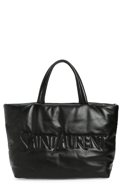 Shop Saint Laurent Logo Embossed Lambskin Leather Tote In Nero