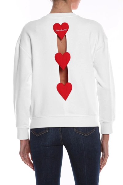 Shop Love Moschino Embroidered Heart Back Slit Cotton Women's Sweater In White