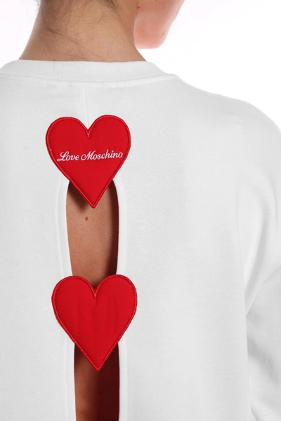 Shop Love Moschino Embroidered Heart Back Slit Cotton Women's Sweater In White