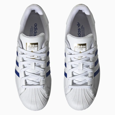 Shop Adidas Originals White/blue Superstar Sneakers