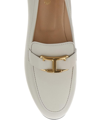 Shop Tod's Mocassins In White