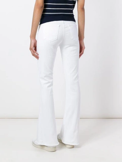 Shop J Brand Flared Trousers In White